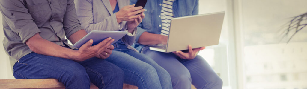 People looking at Laptop